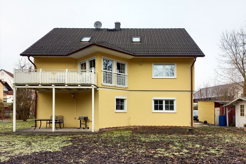 Sanierung Einfamilienhaus Bestandsansicht Terrassenseite in Obertraubling, Landkreis Regensburg